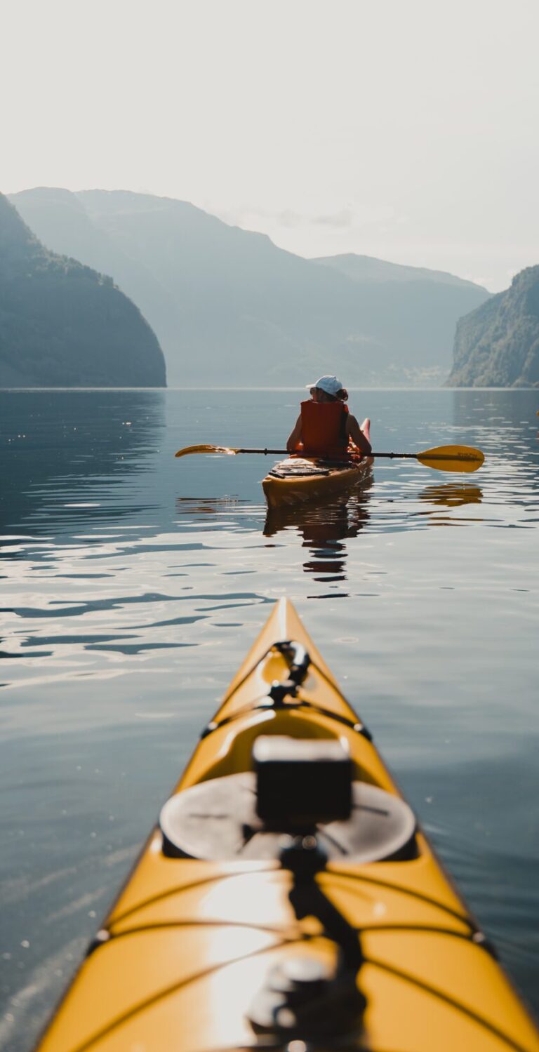 girl paddling in fjords